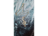 Collana tema musicale con chiave di violino